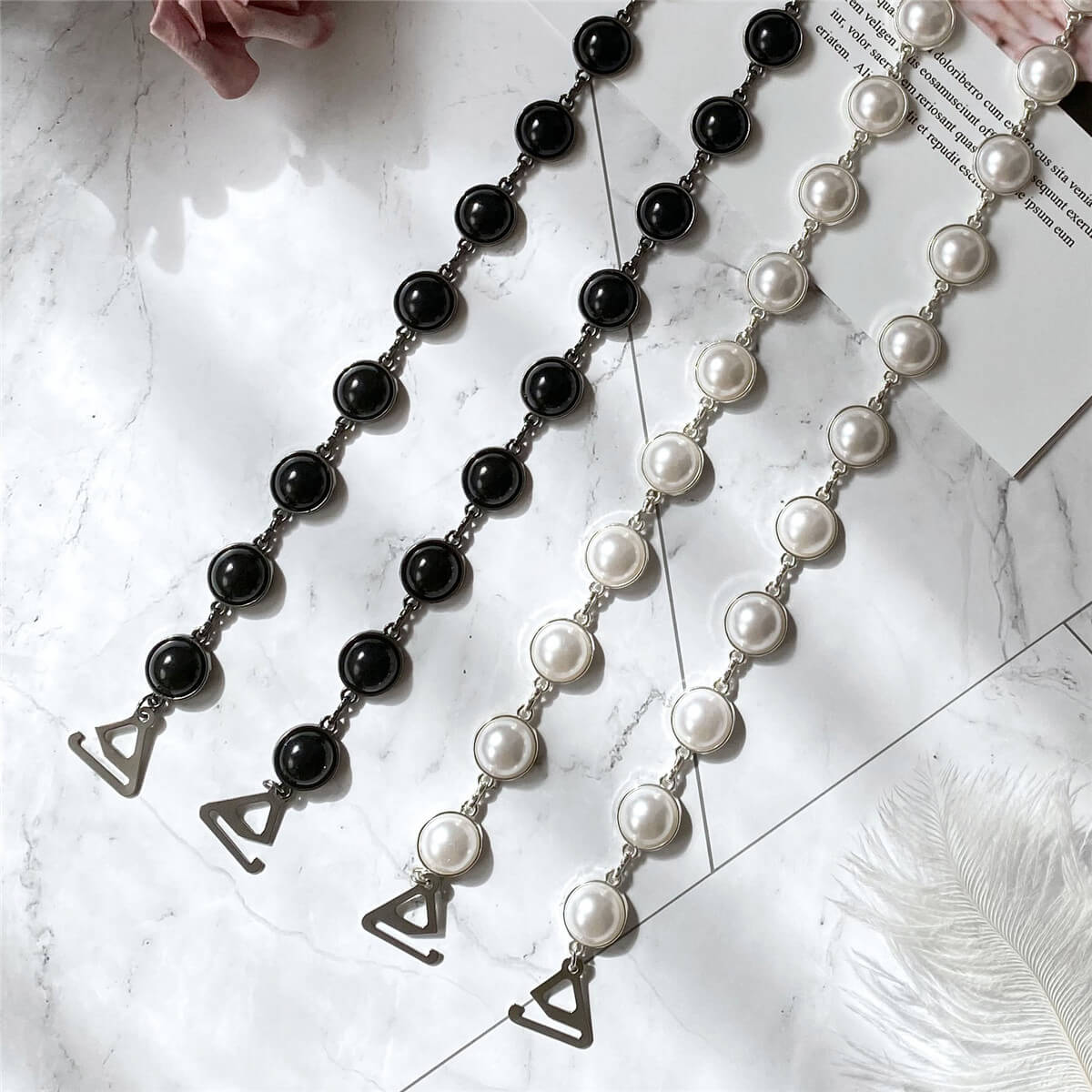 Decorative bra straps with white pearls and crystals